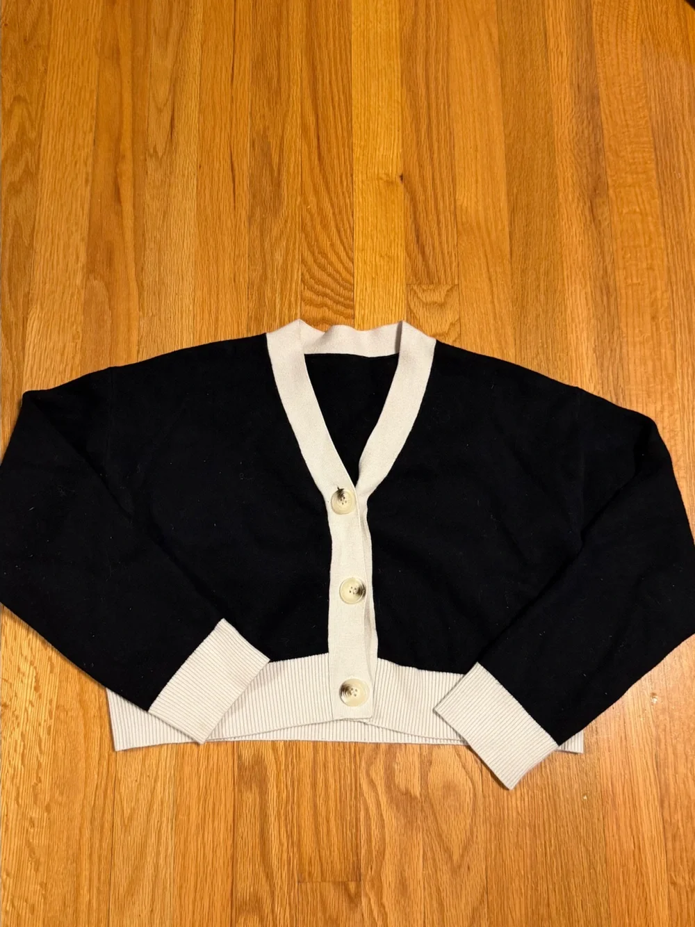Black & white cardigan with white collar and trim no tags